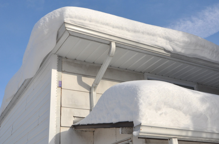 How Winter Storms Can Damage Your Roofing and Siding