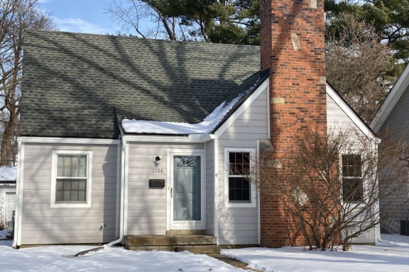 Ypsilanti MI Home Owner's property restored to beauty by John McCarter Construction with new James Hardie Siding and Gutters